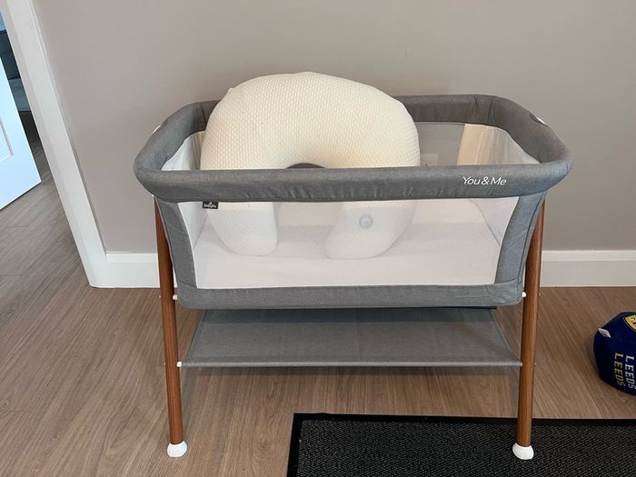 Cot,nursing pillow and new sheets