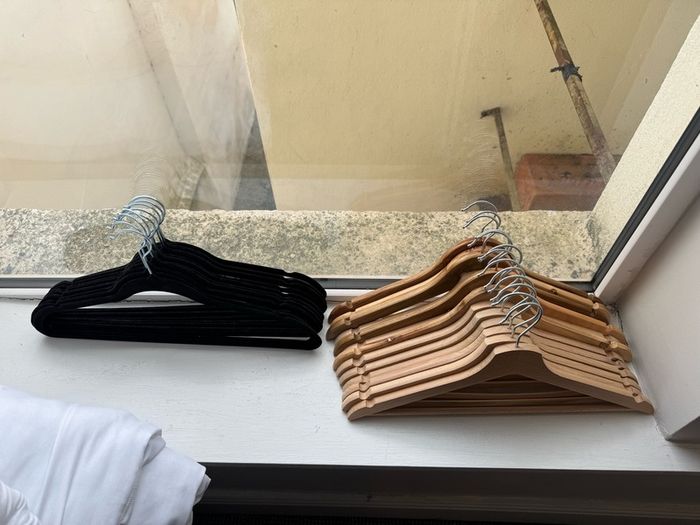 Various cleaning items and shirt hangers