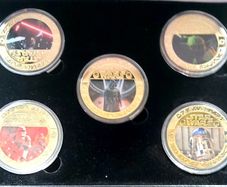 Set of 5 coins star wars in case.