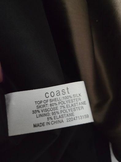 Like new. Size 14 Coast dress with black pencil skirt and olive-green silk frilled top.