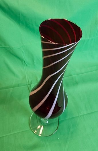 Elegant Murano-style vase made of art glass in ruby red with white spiral stripes