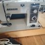 2 Sewing Machine one does zigzag right side main photo the other in left straight only just need a. Puller.  Both working Image 5