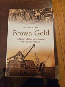 Brown Gold. A History Of Board Na Mona And The Irish Peat Industry. By Donal Clarke. First Edition Paperback In Good Condition.  See Photos For Same.