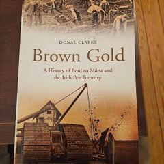 Brown Gold. A History Of Board Na Mona And The Irish Peat Industry. By Donal Clarke. First Edition Paperback In Good Condition.  See Photos For Same.