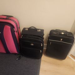 Suit cases x 3