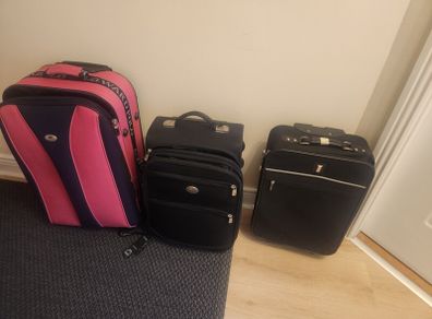 Suit cases x 3