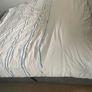 Upholstered grey double bed base with storage and headboard Image 3