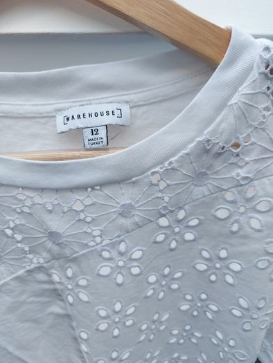 beautiful white top, brand new, warehouse size 12