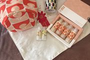 A Bundle of Orla Kiely Products - Bergamot Mini bath and hand set , a pull string wash bag, 2 empty body lotion and conditioner and a limited edition travel porcelain cup for Kenco