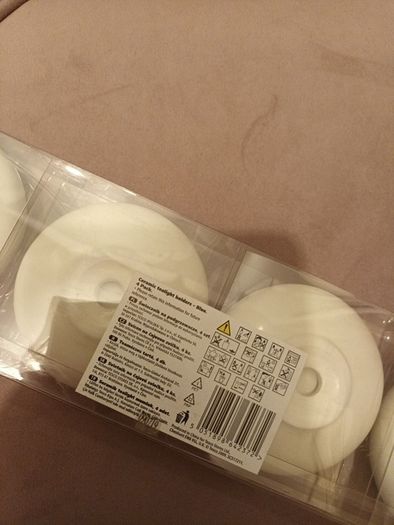 Four ceramic T light holders