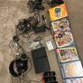 Playstation 2 with games and controllers Image 2