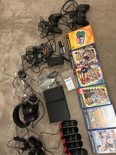Playstation 2 with games and controllers