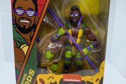 wwe elite teenage mutant ninja turtles Xavier Woods action figure