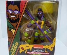 wwe elite teenage mutant ninja turtles Xavier Woods action figure