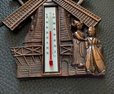 Copper windmill temperature plack.