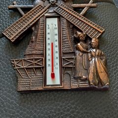 Copper windmill temperature plack.