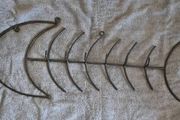 Wall hanger / coats , large iron fish skeleton.
