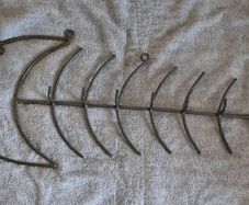Wall hanger / coats , large iron fish skeleton.