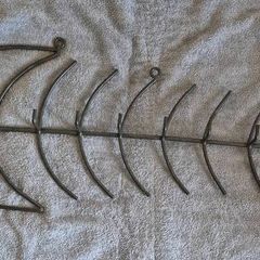 Wall hanger / coats , large iron fish skeleton.