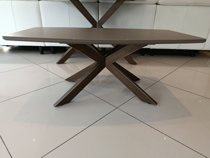 Coffee table from Eazy Living, brown glass top