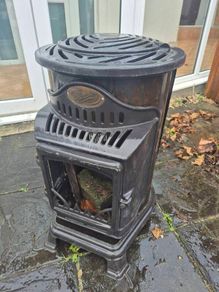 Old province gas heater (used as outdoor fire pit)