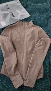 gym jacket sclupted from thrivin