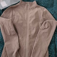 gym jacket sclupted from thrivin