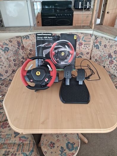 A  Ferrari wheel and pedals for xbox good condition
