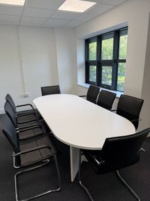 White modern boardroom table  with 8 chairs
