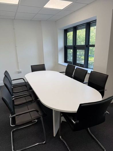 White modern boardroom table  with 8 chairs