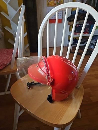 Vintage and quirky Suzuki safety helmet with visor.