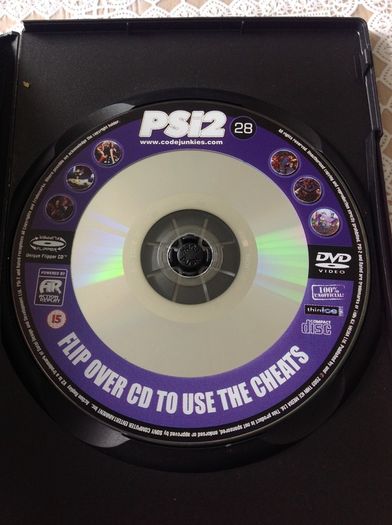 2 PS2 Cheat Discs.