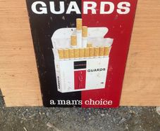 Guards Cigarette Tin Sign