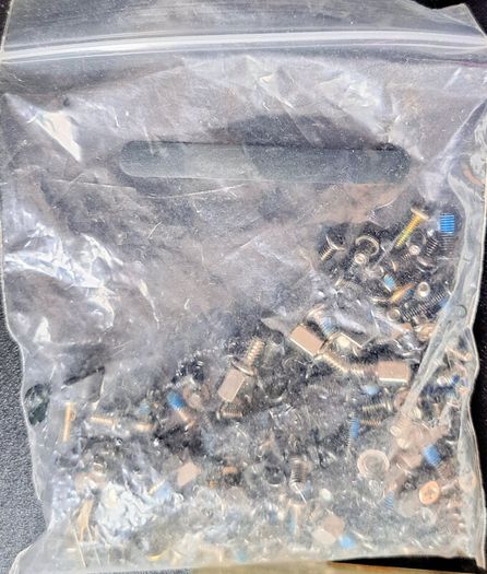 Boxes of miscellaneous watch parts