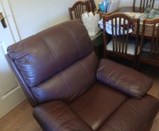 Brown leather recliner armchair