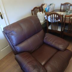 Brown leather recliner armchair