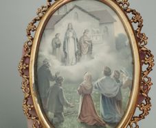 An antique-style painting set in an ornate, gold-toned frame.