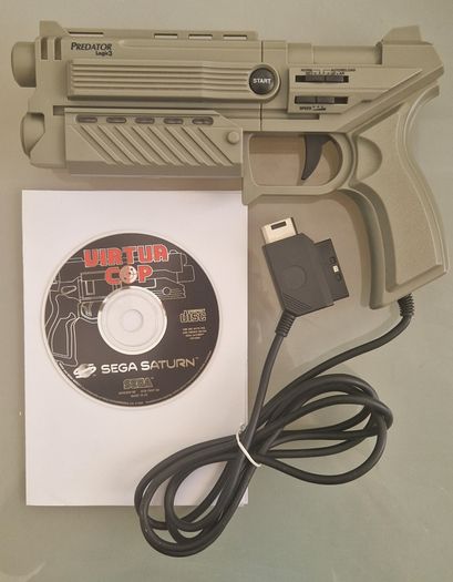 Sega Saturn w/ 3D Control Pad, Arcade Racer, Lightgun and Games
