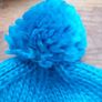 The North Face turquoise winter hat Image 5