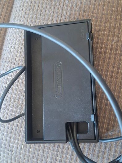 Portable Nitendo Switch, charging dock.