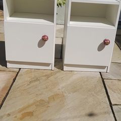 A pair of vintage wooden beside lockers