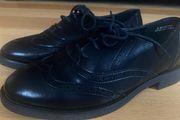 Black brogue shoes
