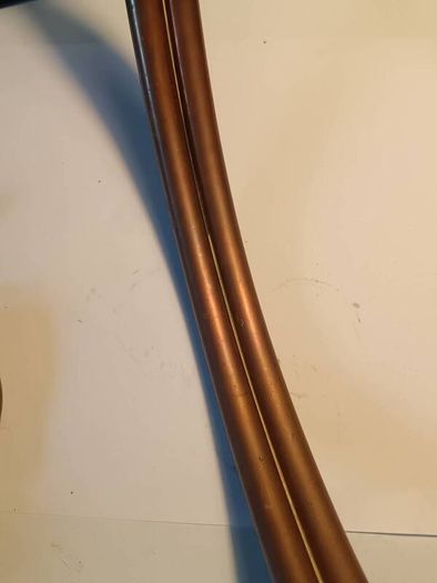A Pair of Copper and Brass Horns