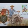 T-Rex Dinosaur collectors coin in vintage stamp cover Image 2
