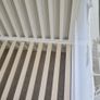 Nested Sorrento wooden cot bed white from Smyths Image 2