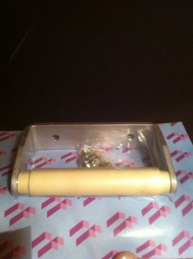 Toilet roll holders