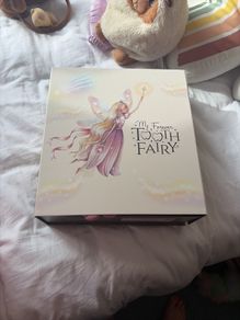 Girls tooth fairy doll and book