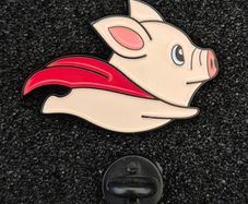 Flying pig , pin back badge.