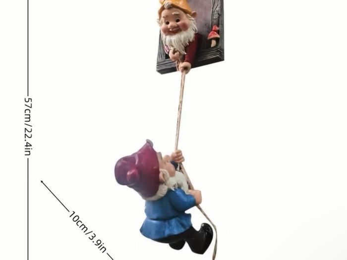 Gnome climbing statues for tree