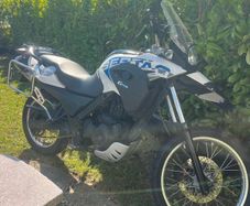 Motorbike with helmit, 2 jackets, gloves and lock.